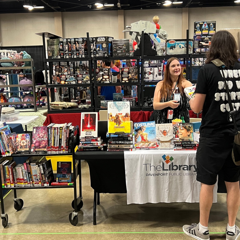 Library booth at a comic convention.